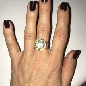 Ring with small stokes and one big stone